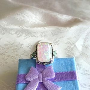 Emerald cut opal ring